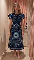 Front view of navy paisley print midi dress