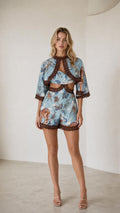 Front view of light blue printed crop top and shorts set
