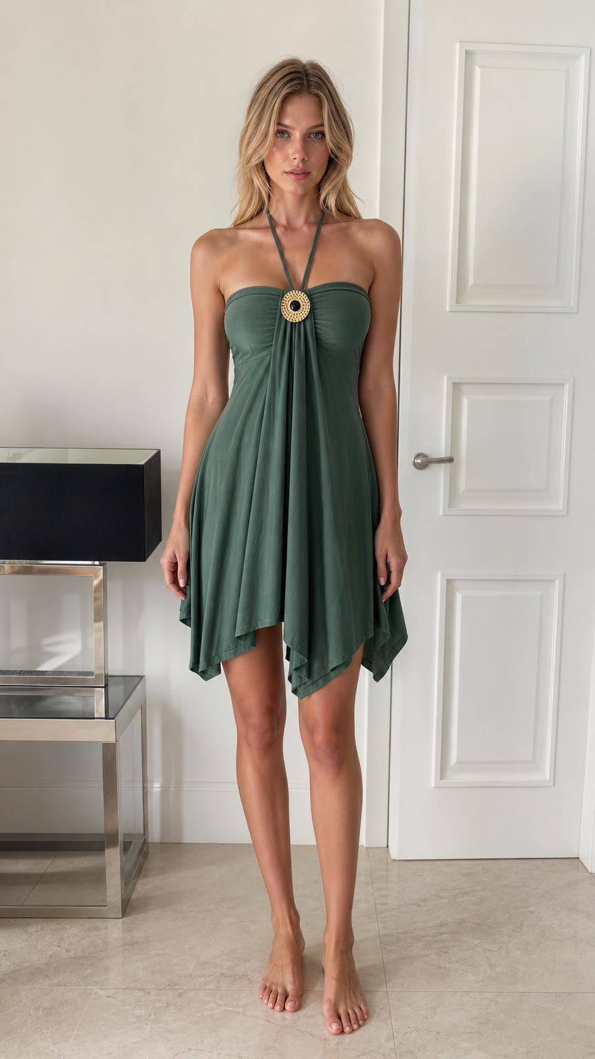 Front view of model wearing sage green halter neck mini dress