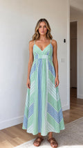 Front view of green striped V-neck maxi dress