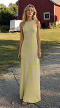 Front view of yellow ribbed knit maxi dress outdoors