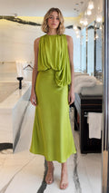 Front view of woman wearing Lime Green draped midi dress