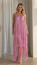 Front view of model wearing pink halter neck fringe maxi dress