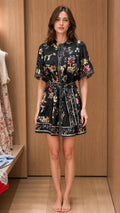 Front view of woman wearing Black floral mini dress