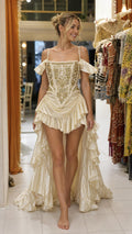 Front view of Champagne Renaissance corset high-low ruffle gown