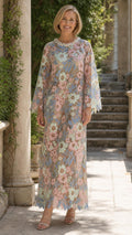 Full front view of model wearing champagne pink floral lace maxi dress