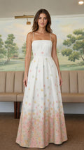 Front view of woman wearing white floral ombre maxi dress