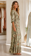 Sage floral maxi dress with deep V neckline shown from the side