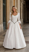 Front view of woman wearing white Renaissance vintage maxi dress