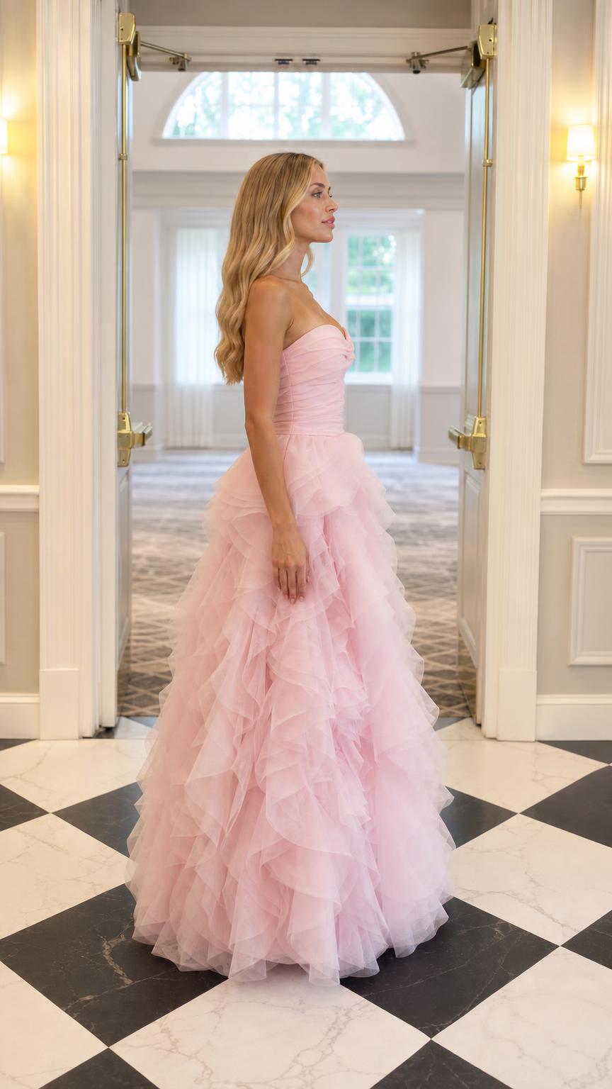Side profile view of pink tulle evening gown