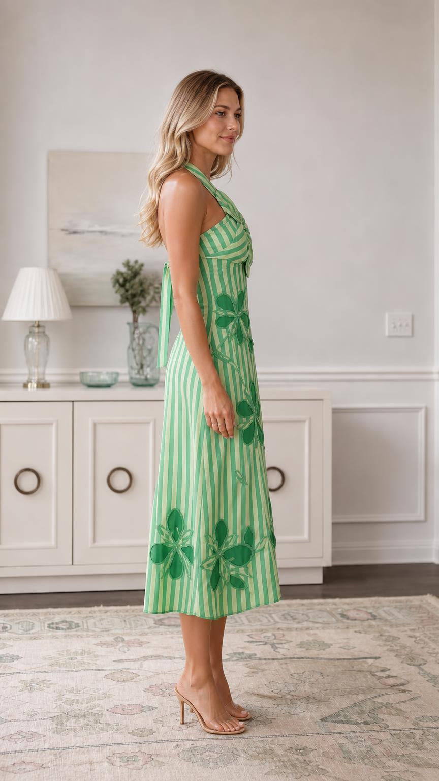 Side view of green striped midi dress