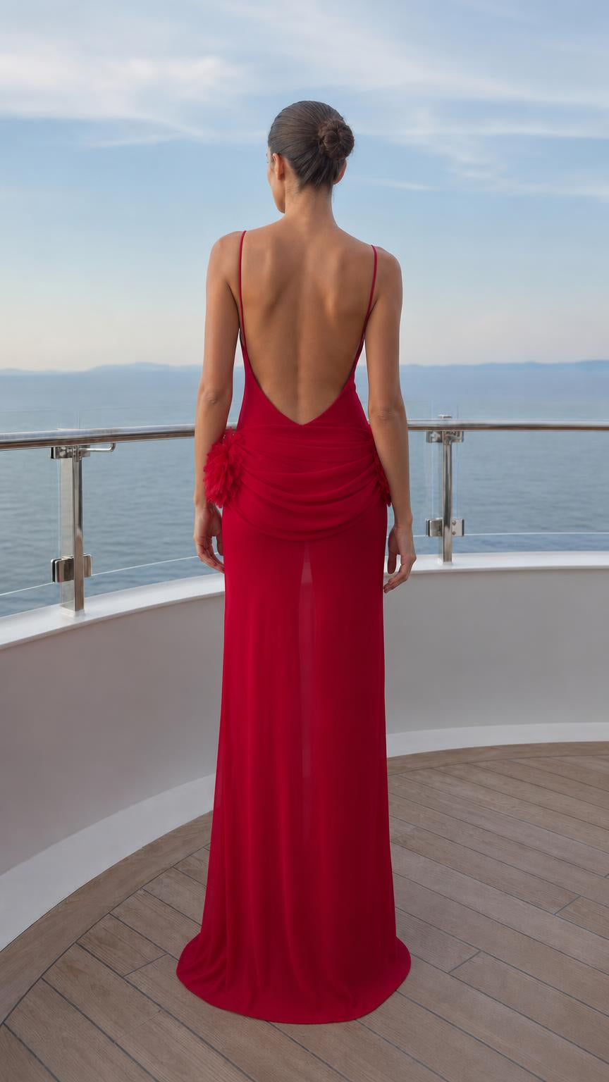 Back view showing low scoop back of red maxi dress