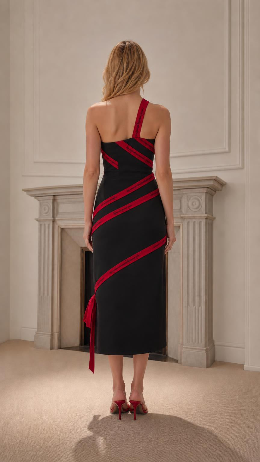 Back view of black midi dress with asymmetric strap