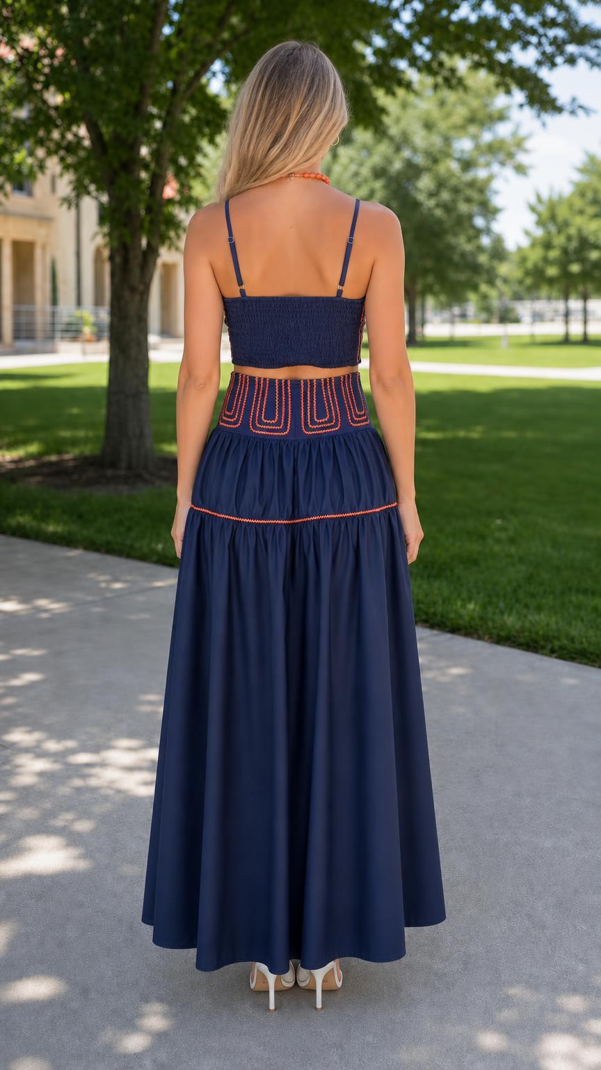 Back view of navy crop top and tiered maxi skirt set