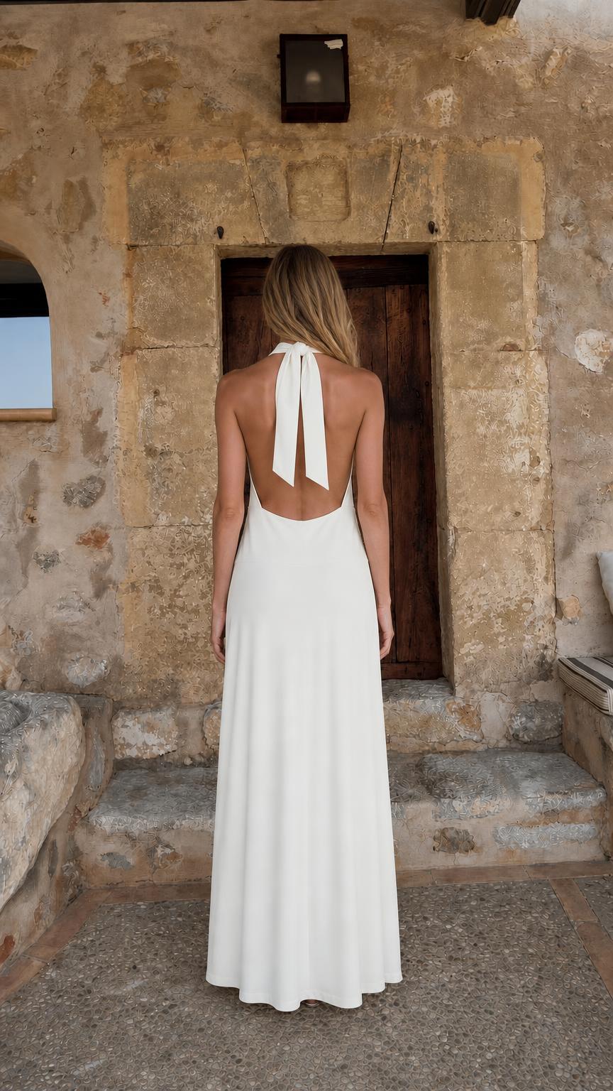 Back view of woman showing tie-halter and open back design