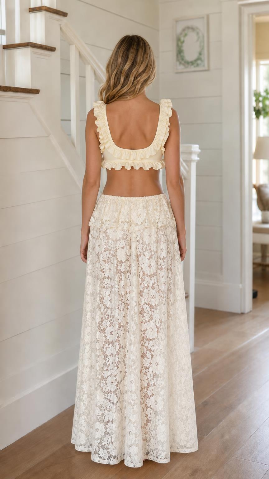 Model wearing ivory two-piece set from back view