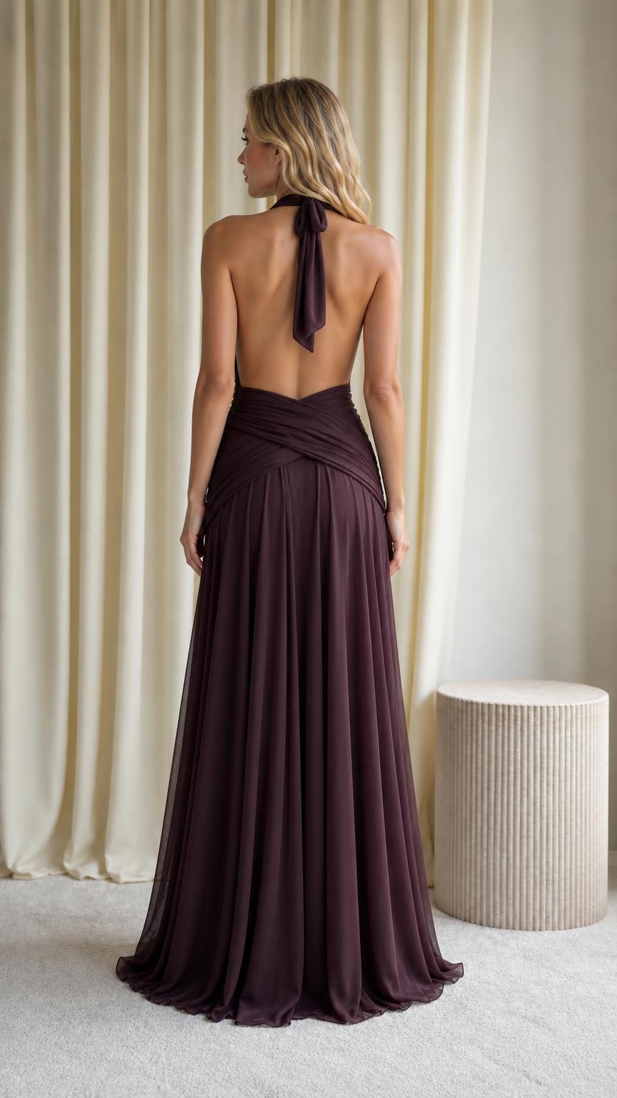 Back view of plum halter evening gown showing open back