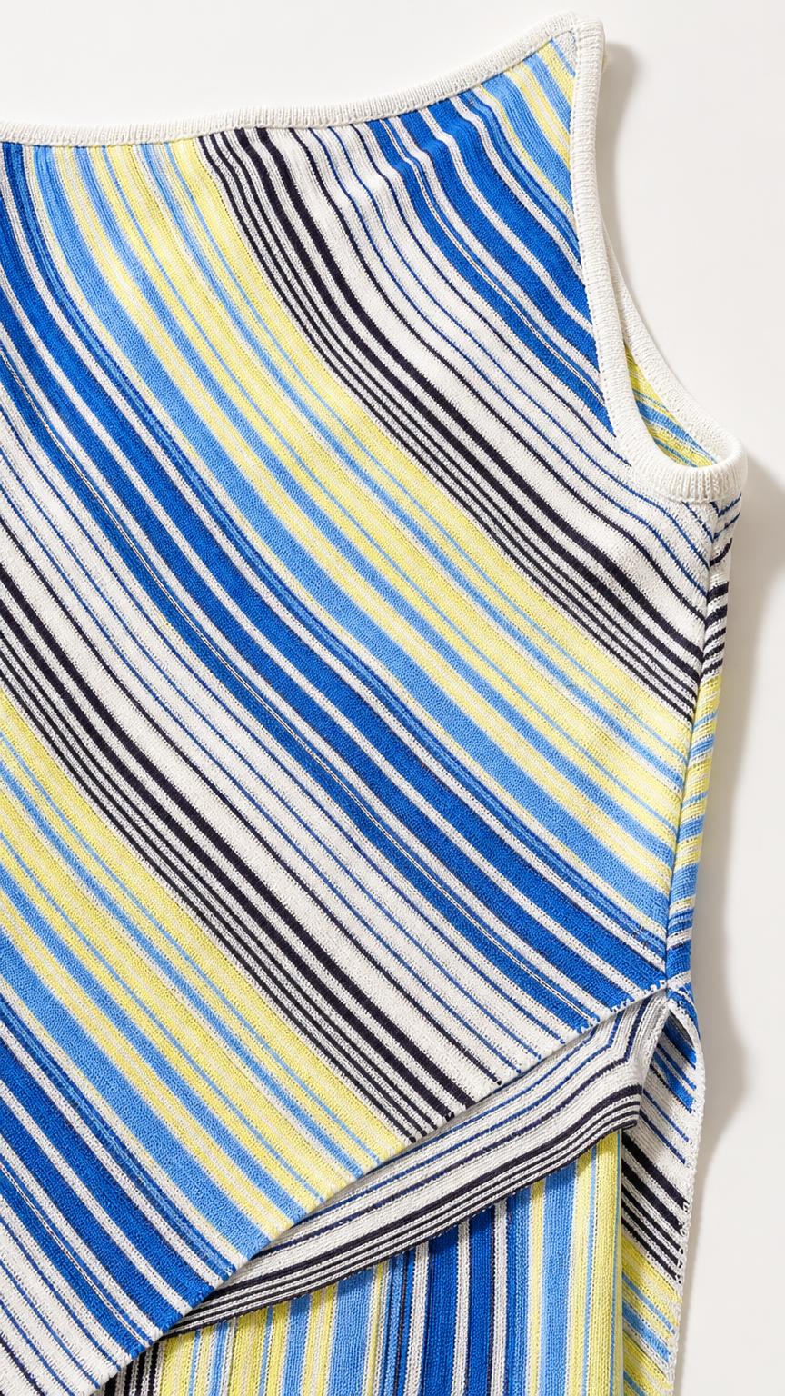 Close-up detail of blue multi striped soft knit fabric and asymmetrical hem