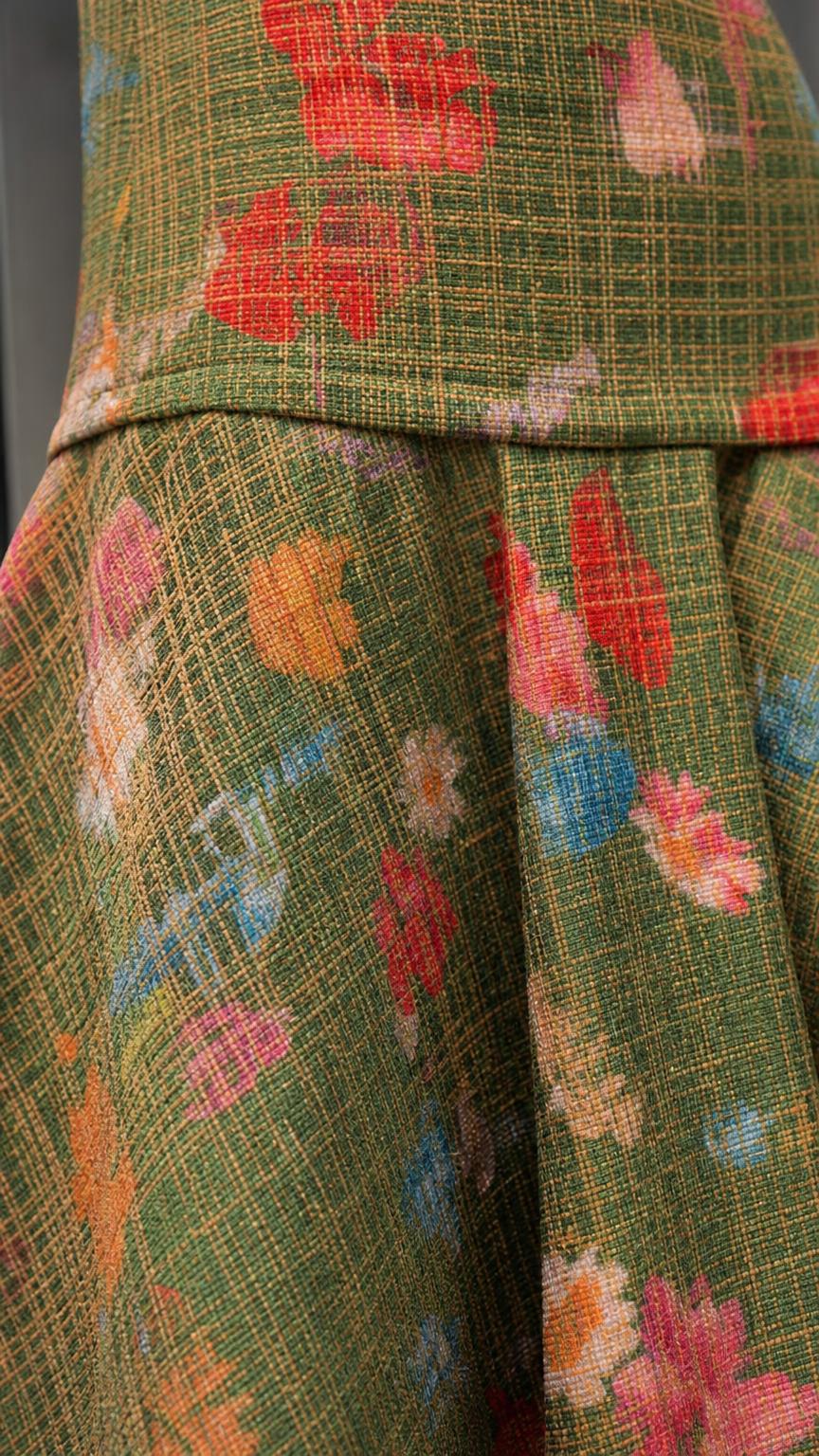 Close-up of green floral tweed fabric texture and pattern