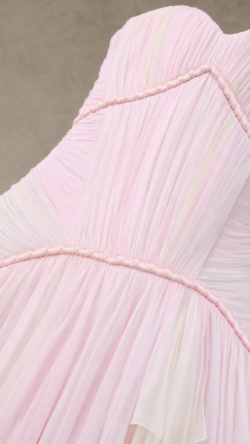 Close-up of pink pleated chiffon bodice and braided trim