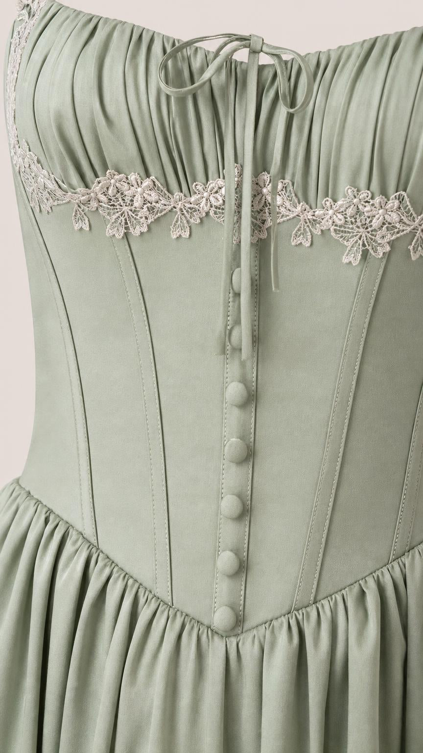 Close-up of bodice, buttons, and lace trim on Sage Green dress