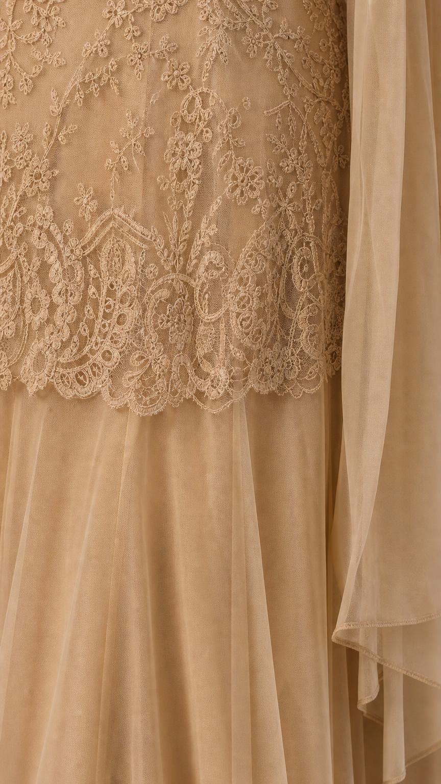 Close-up detail of lace bodice and layered tulle hem